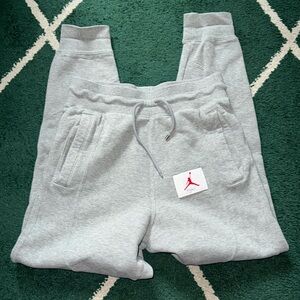 Jordan Light Gray Track Joggers with Red Jumpman Patch